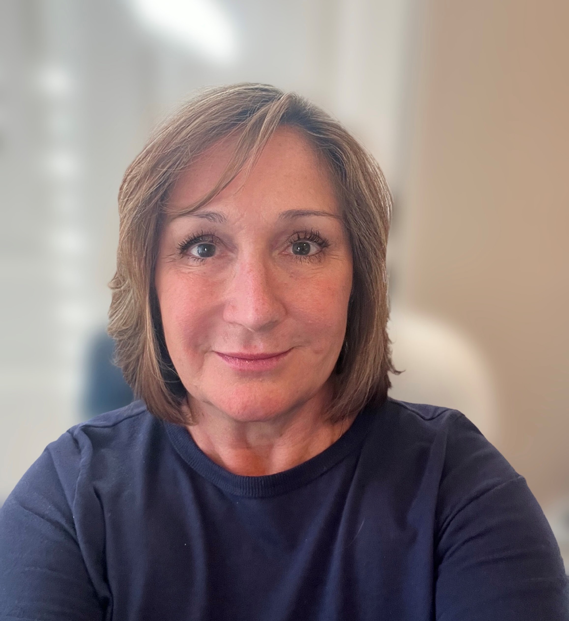 photo of Kim Silva, Listing Department Manager